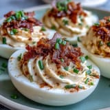Classic deviled eggs elevated with smoky bacon and zesty ranch dressing, perfect for Easter brunch or party platters.