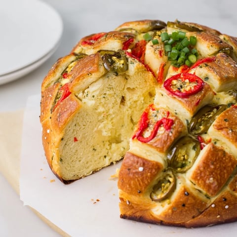 Golden, bubbly Pimento Cheese & Jalapeño Pull-Apart Grilled Cheese, ready for sharing on game day.