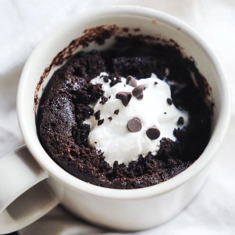 Fluffy Oreo mug cake, a quick chocolate dessert, ready to enjoy in minutes.