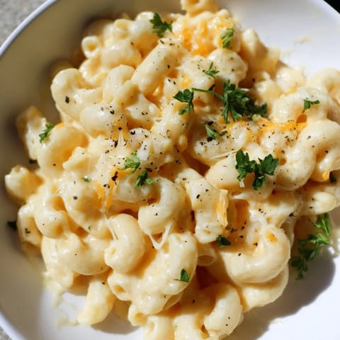 This comforting One-Pot Butternut Squash Mac & Cheese features creamy sauce, tender pasta for a delightful meal.