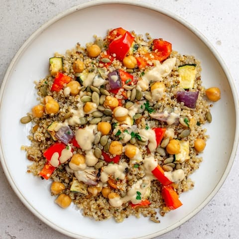 A beautiful shot of the healthy Quinoa Power Protein Salad, showing fresh ingredients and bright colors.