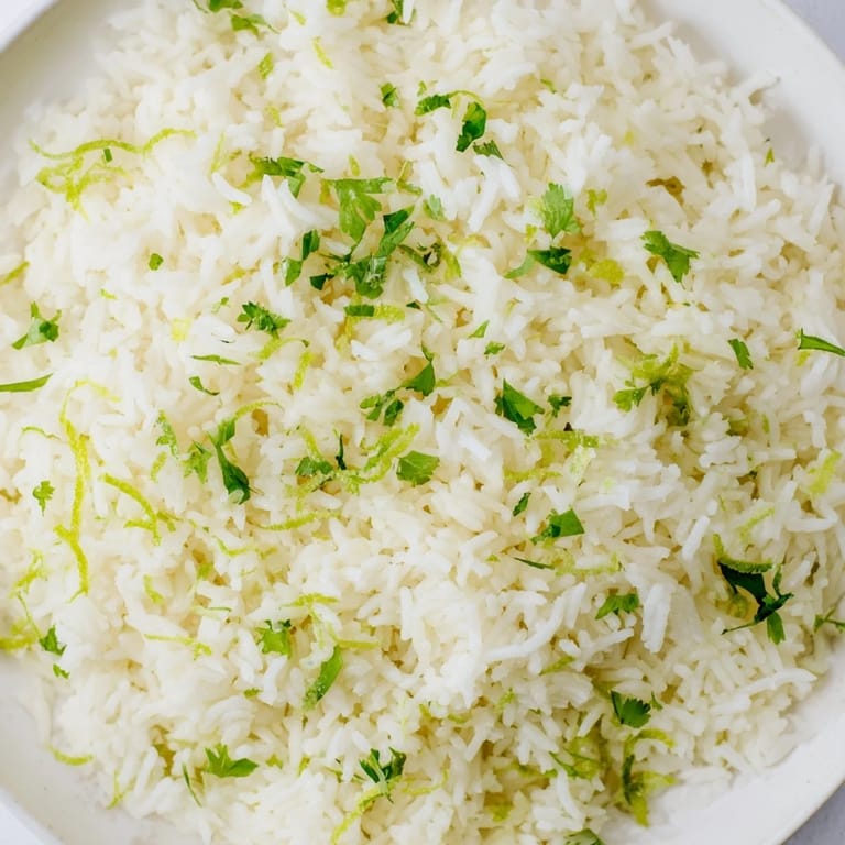 A vibrant bowl of citrusy Cilantro Lime Rice ready to serve, brimming with fresh, flavorful ingredients.