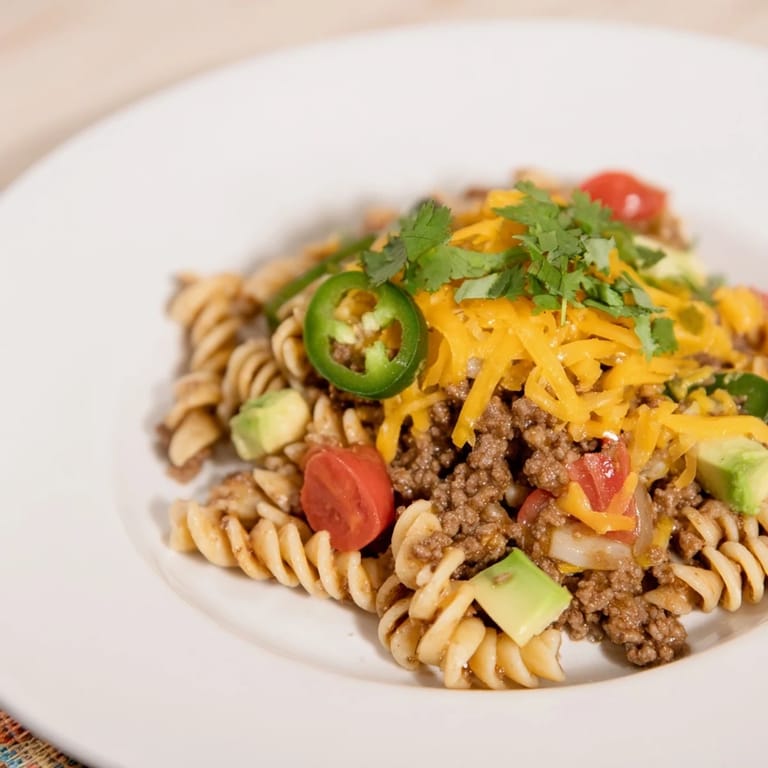 A flavorful Beef Taco Pasta Skillet with tender pasta and savory ground beef, perfect for a cozy night.