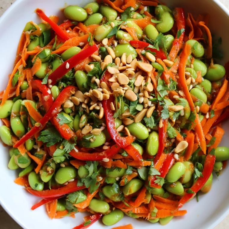 A close-up of Asian Edamame Salad, garnished with sesame seeds, ready to be enjoyed.
