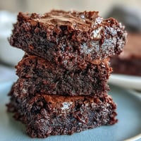 A tray of fudgy brownie mix cookies with crinkled tops, perfect for quick chocolate cravings.